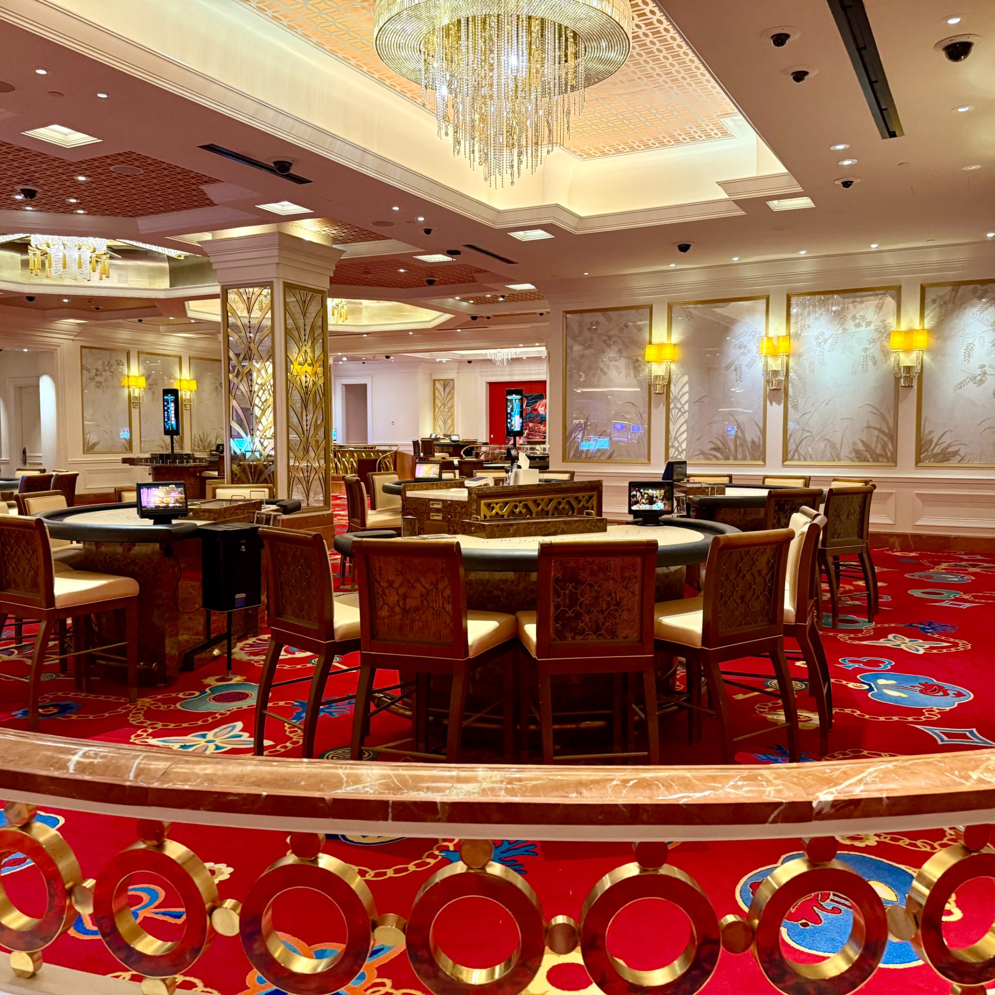 The casino floor at Baha Mar, chandeliers above the gaming tables