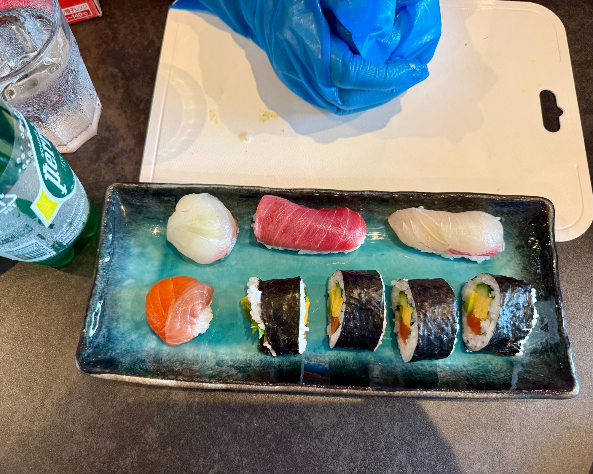 The finished sushi platter — nigiri and rolls