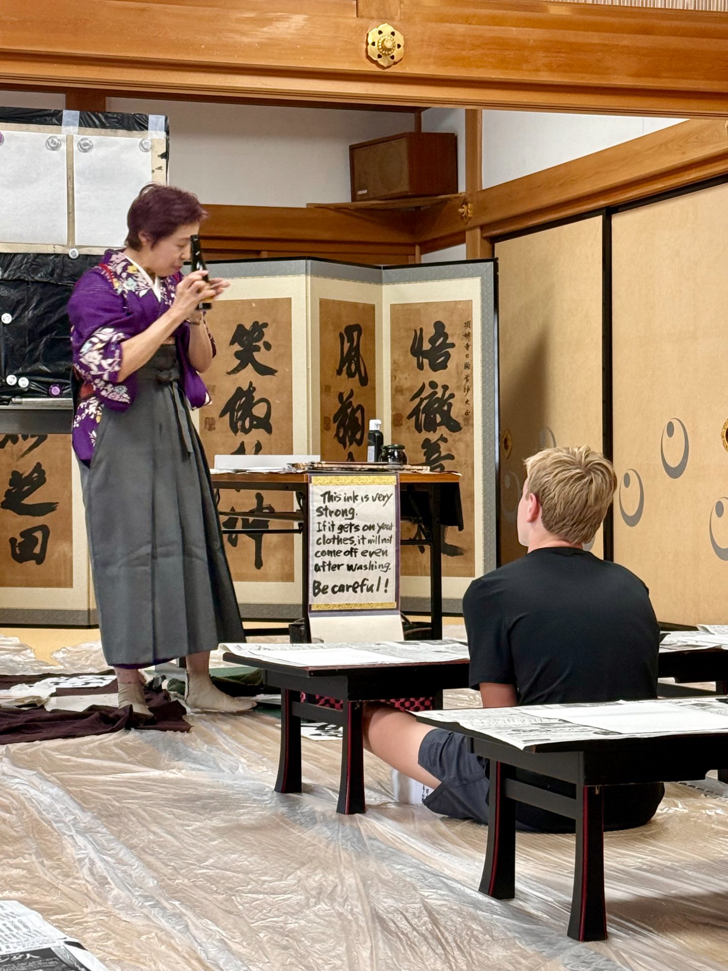 A calligraphy lesson at a traditional temple in Kyoto